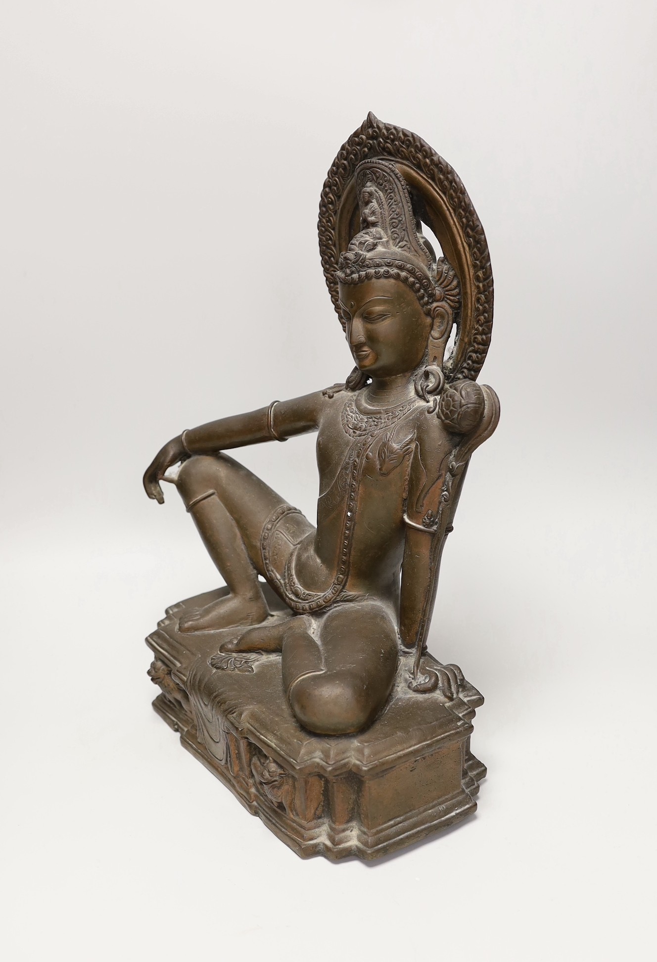 A Buddhist bronze figure of Avalokiteshvara seated in Royal ease, 40cm